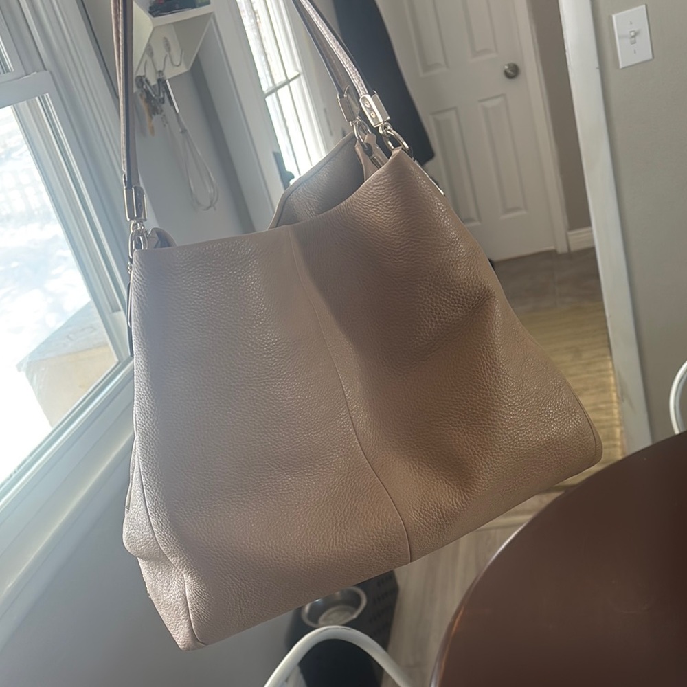 Coach Tan Shoulder Bag with Soft Leather and Spacious Design